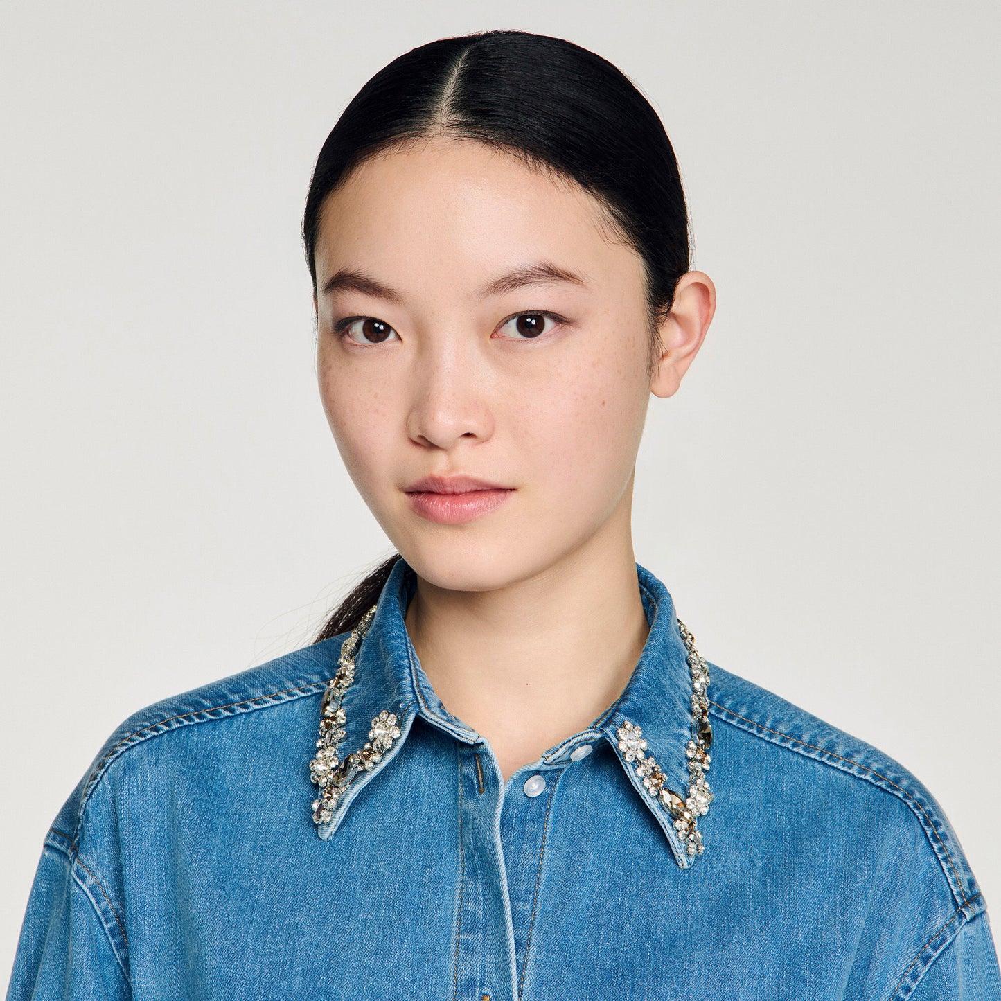 Denim shirt with rhinestones