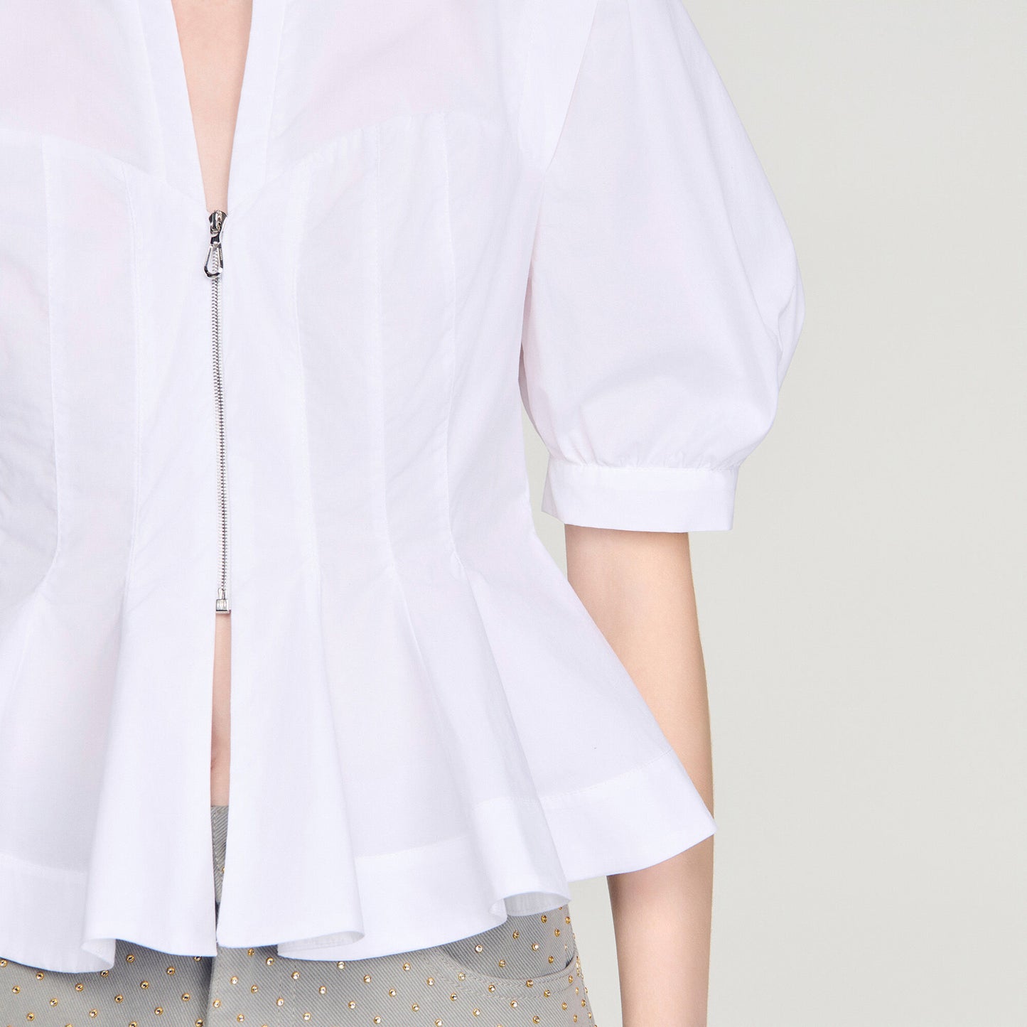 Zipped peplum shirt