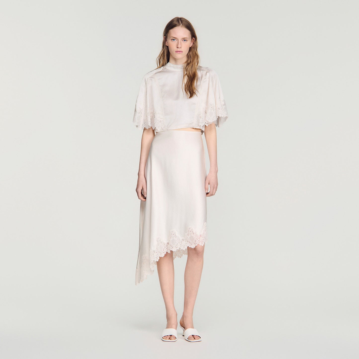 Asymmetrical satin skirt with lace