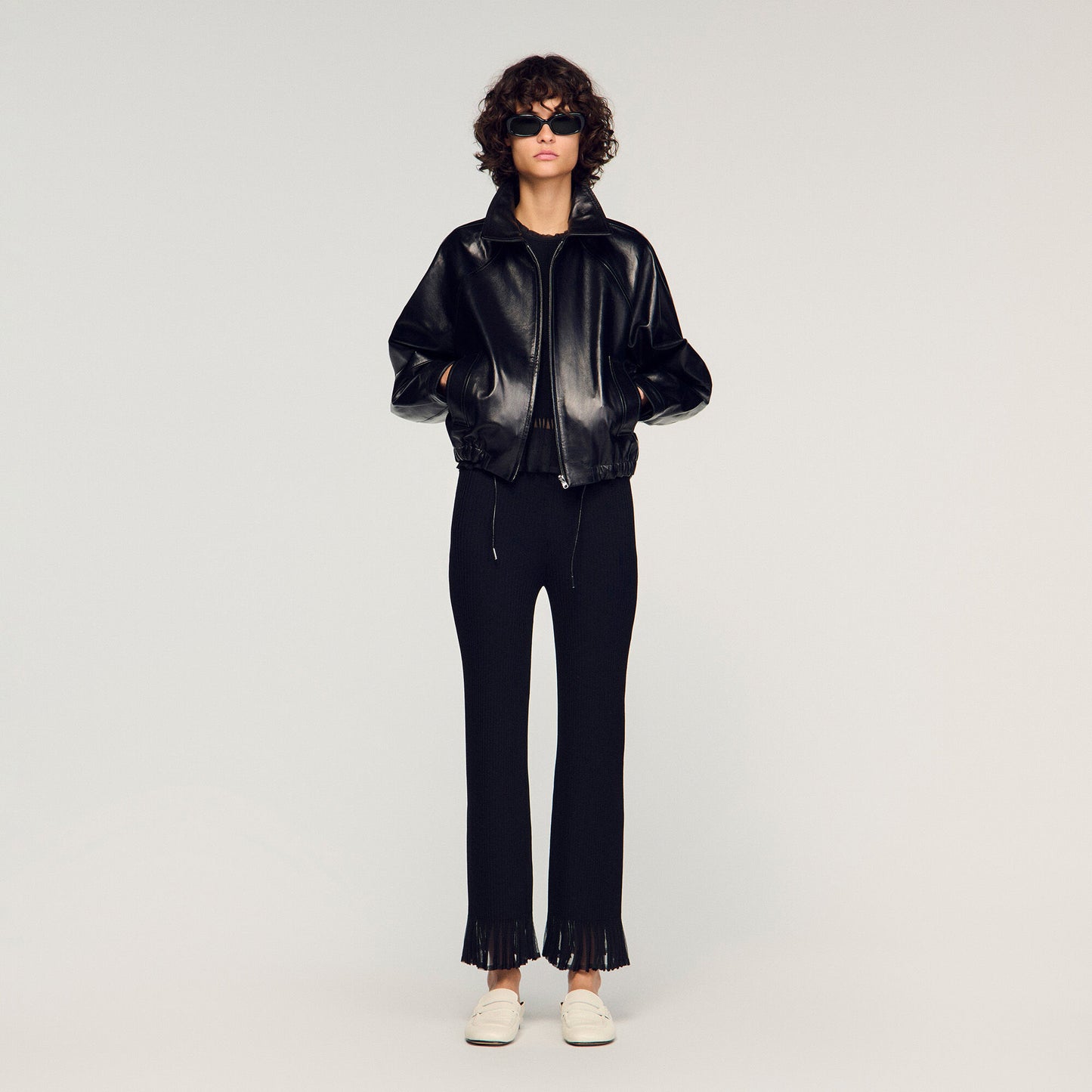 Ruffled knit trousers