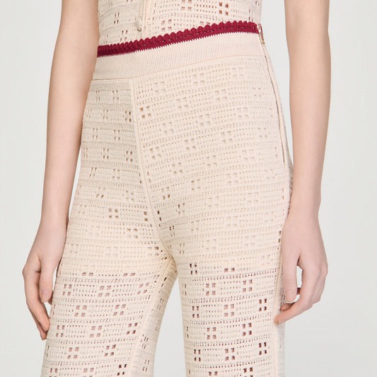 Crochet-look knit trousers