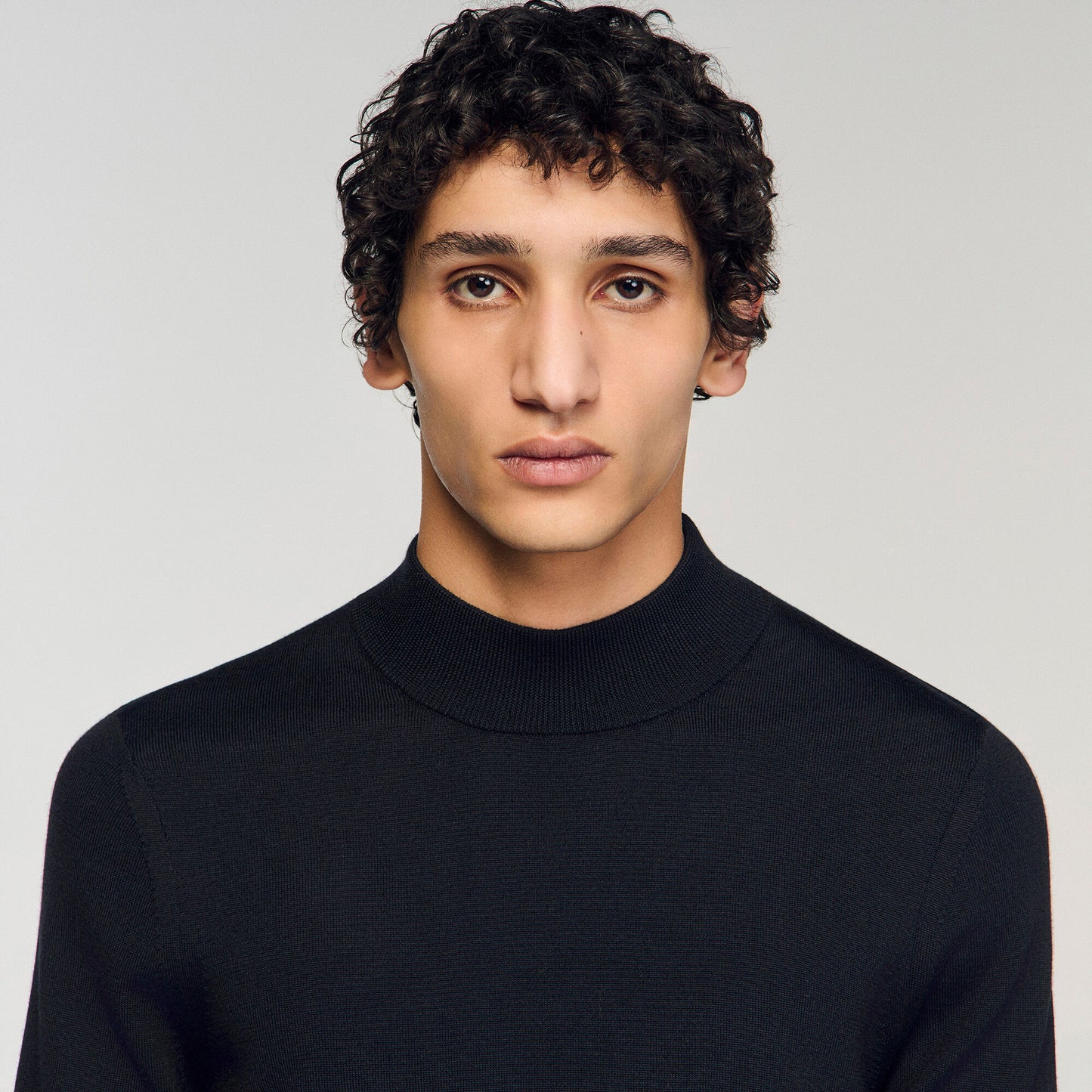 Wool jumper with a high collar