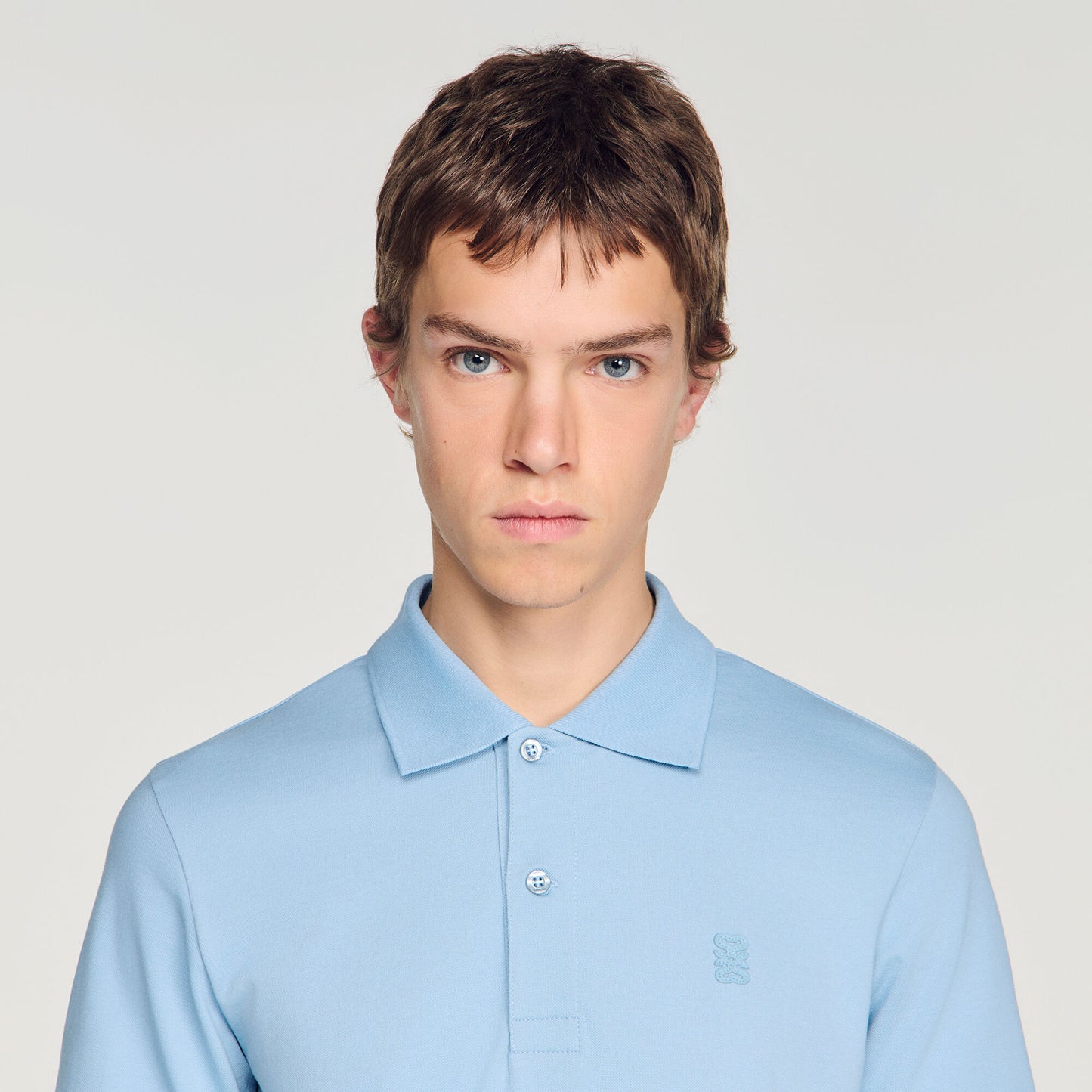 Cotton polo shirt with leather logo
