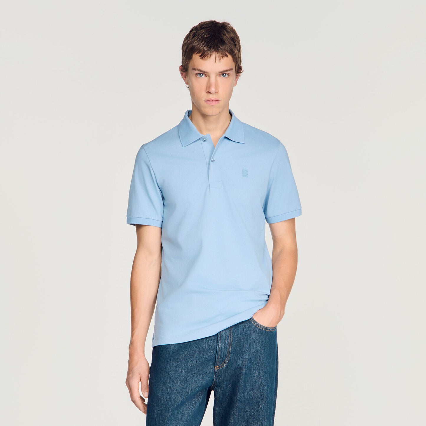 Cotton polo shirt with leather logo